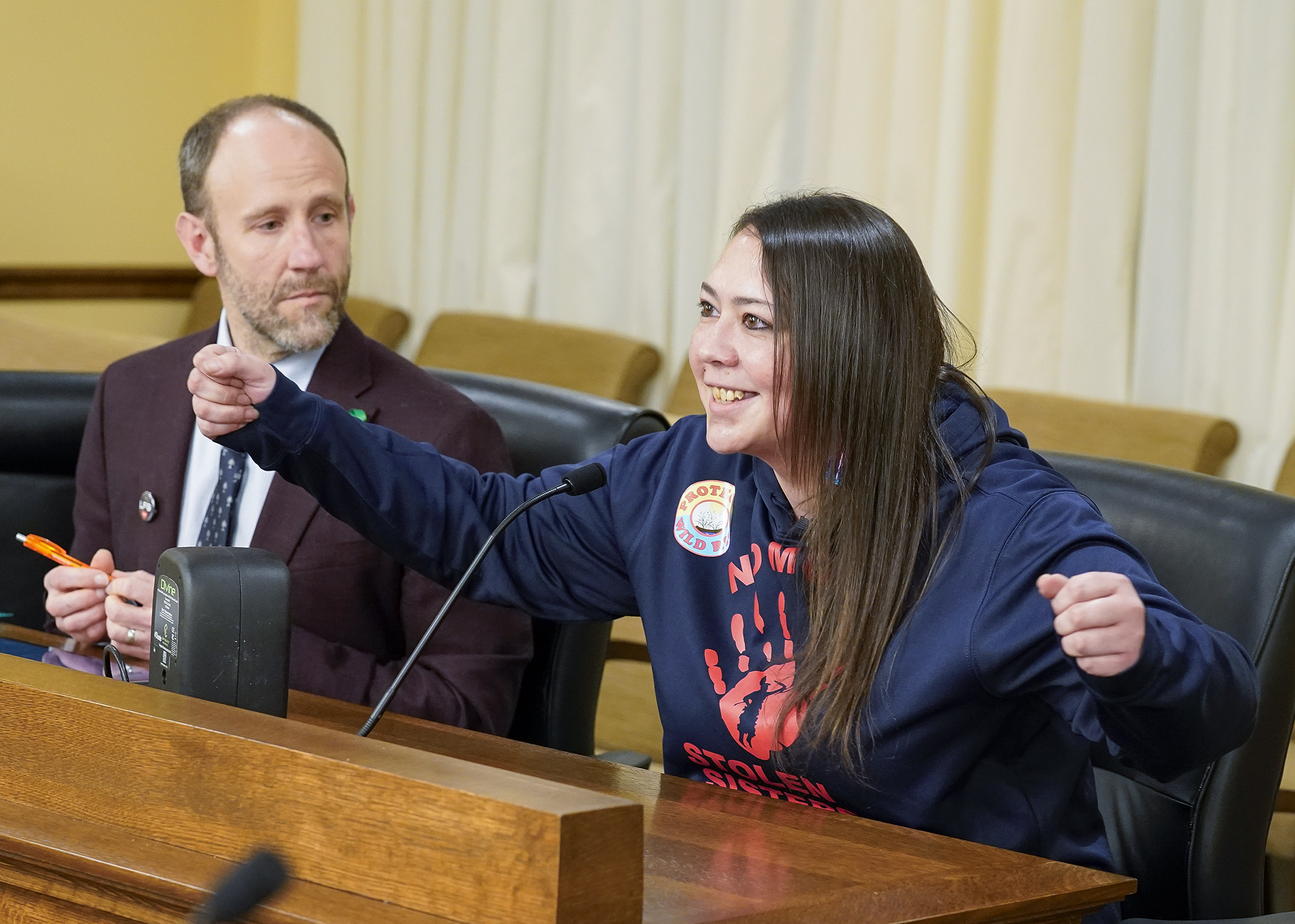 Part of the Rise & Repair Alliance, Gina Peltier testifies before the House environment committee March 26 in support of a bill that would prohibit operation of a watercraft in a manner that threatens uncultivated wild rice. (Photo by Andrew VonBank)